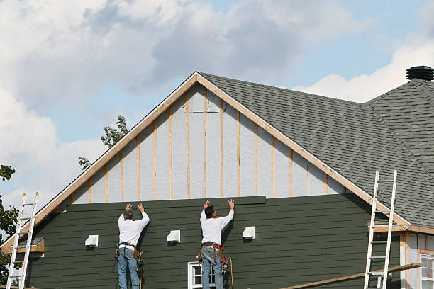 Professional Siding technician working in Bellville, TX